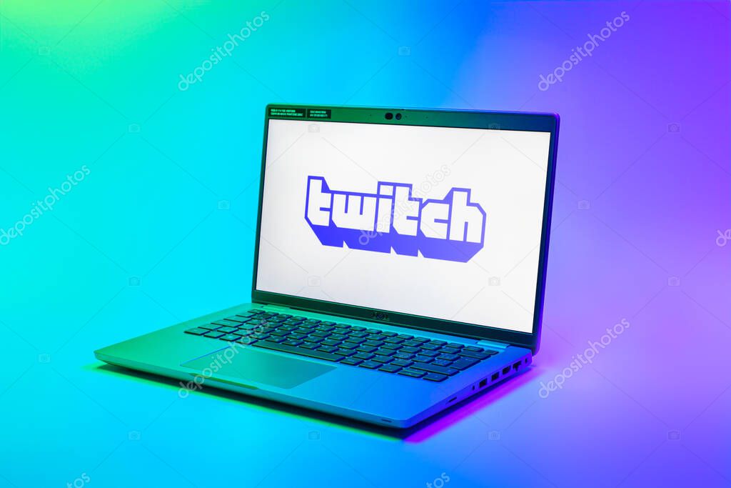 Prague, Czechia - 02 21 2025: Laptop on surface showing Twitch logo.