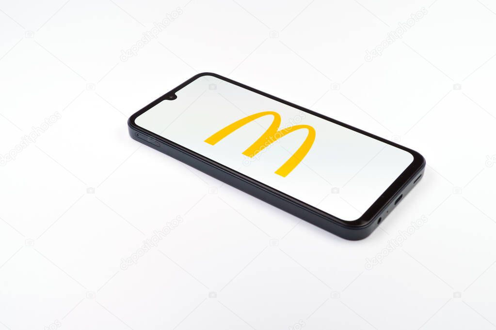 Prague, Czechia - 02 21 2025: Laptop on surface showing McDonalds logo.