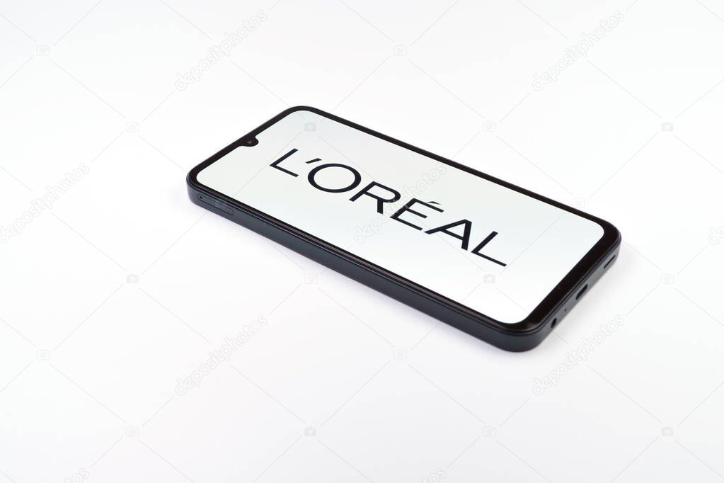 Prague, Czechia - 02 21 2025: Laptop on surface showing L'Oreal logo.
