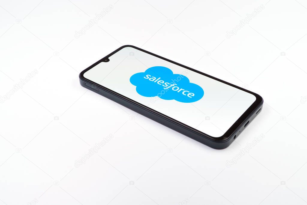 Prague, Czechia - 02 21 2025: Laptop on surface showing Salesforce logo.