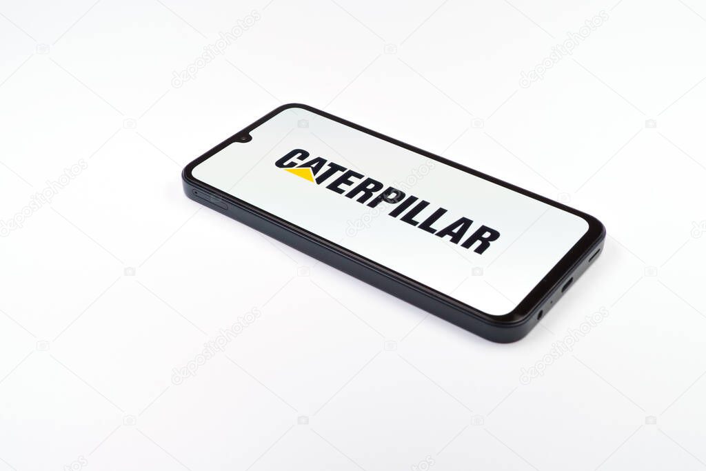 Prague, Czechia - 02 21 2025: Laptop on surface showing Caterpillar logo.