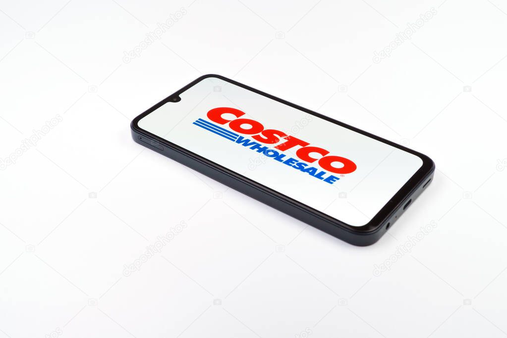 Prague, Czechia - 02 21 2025: Laptop on surface showing Costco logo.