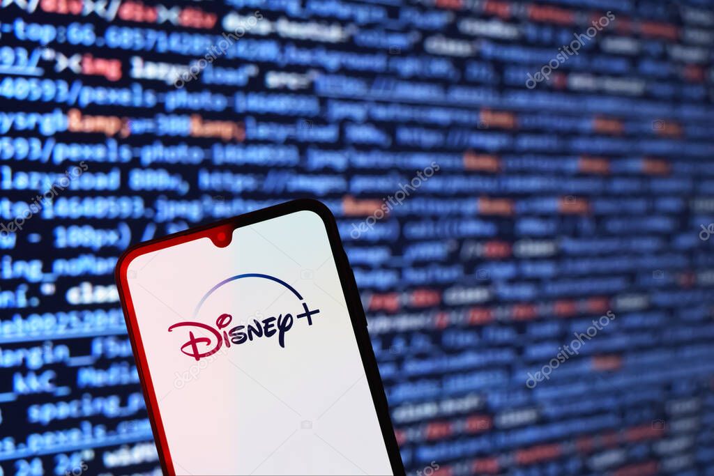 Prague, Czechia - 02 21 2025: Laptop on surface showing Disney + logo.