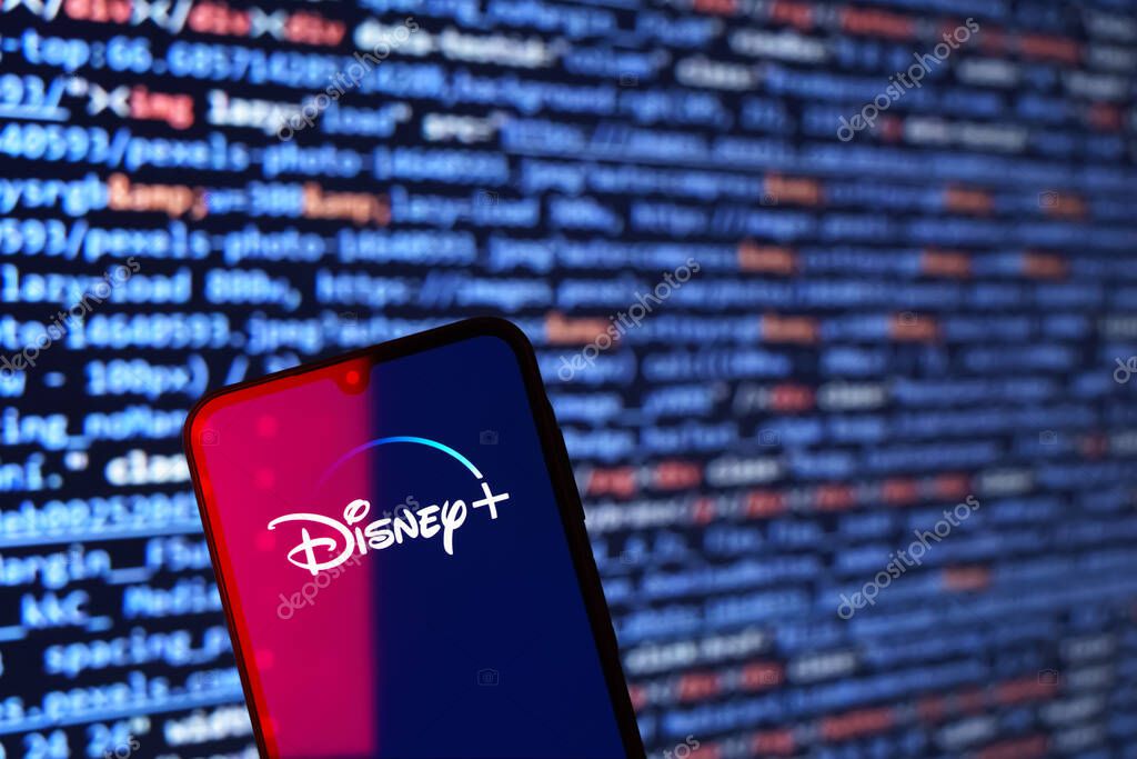 Prague, Czechia - 02 21 2025: Laptop on surface showing Disney + logo.