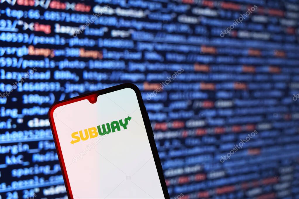Prague, Czechia - 02 21 2025: Laptop on surface showing Subway logo.