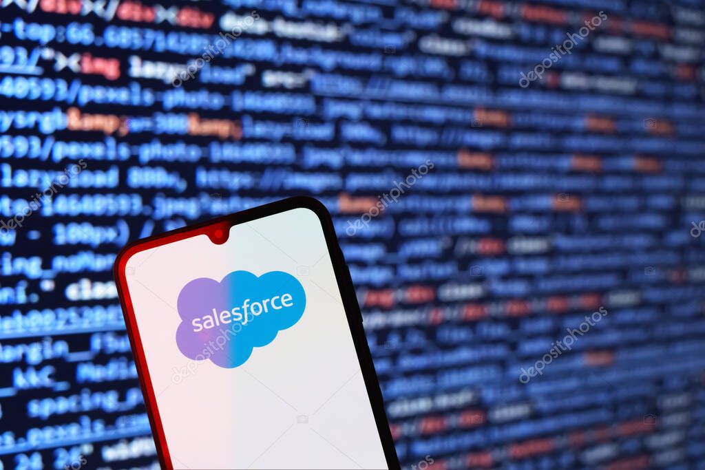 Prague, Czechia - 02 21 2025: Laptop on surface showing Salesforce logo.