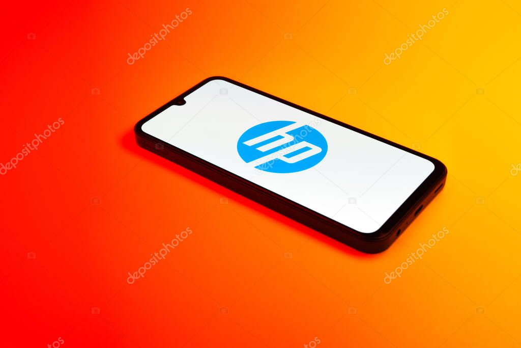 Prague, Czechia - 02 21 2025: Laptop on surface showing Hewlett-Packard logo.