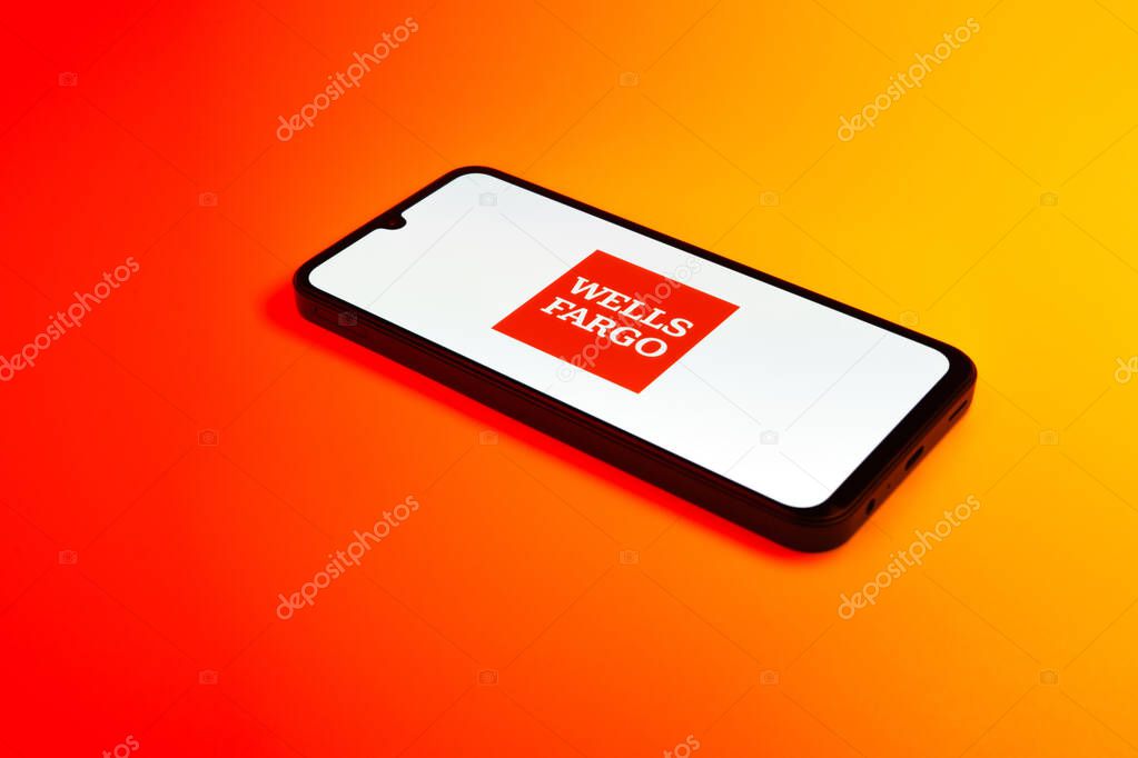 Prague, Czechia - 02 21 2025: Laptop on surface showing Wells Fargo logo.