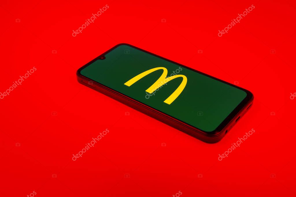 Prague, Czechia - 02 21 2025: Laptop on surface showing McDonalds logo.