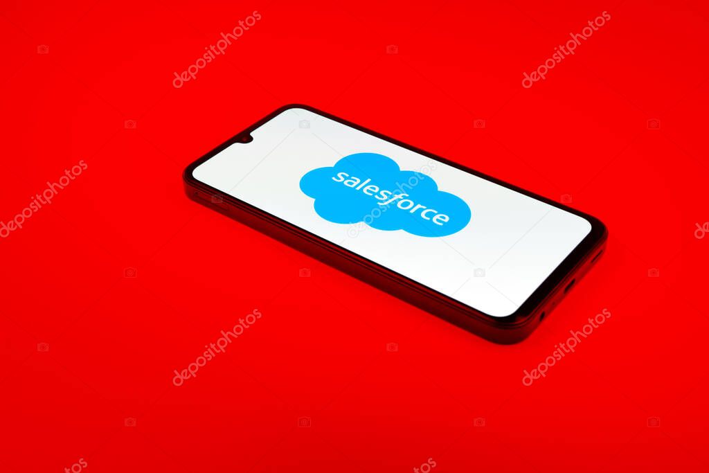 Prague, Czechia - 02 21 2025: Laptop on surface showing Salesforce logo.
