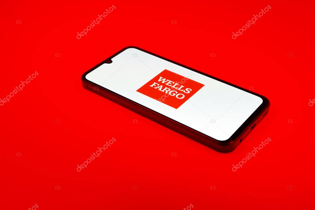 Prague, Czechia - 02 21 2025: Laptop on surface showing Wells Fargo logo.