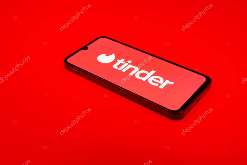 Prague, Czechia - 02 21 2025: Laptop on surface showing Tinder logo.
