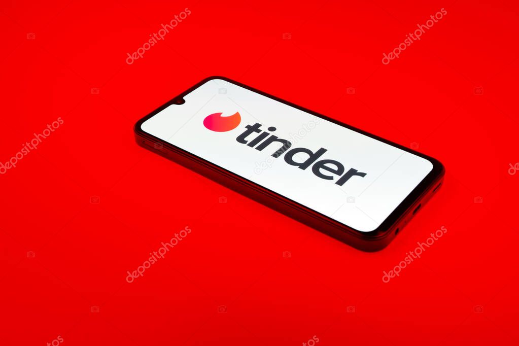 Prague, Czechia - 02 21 2025: Laptop on surface showing Tinder logo.