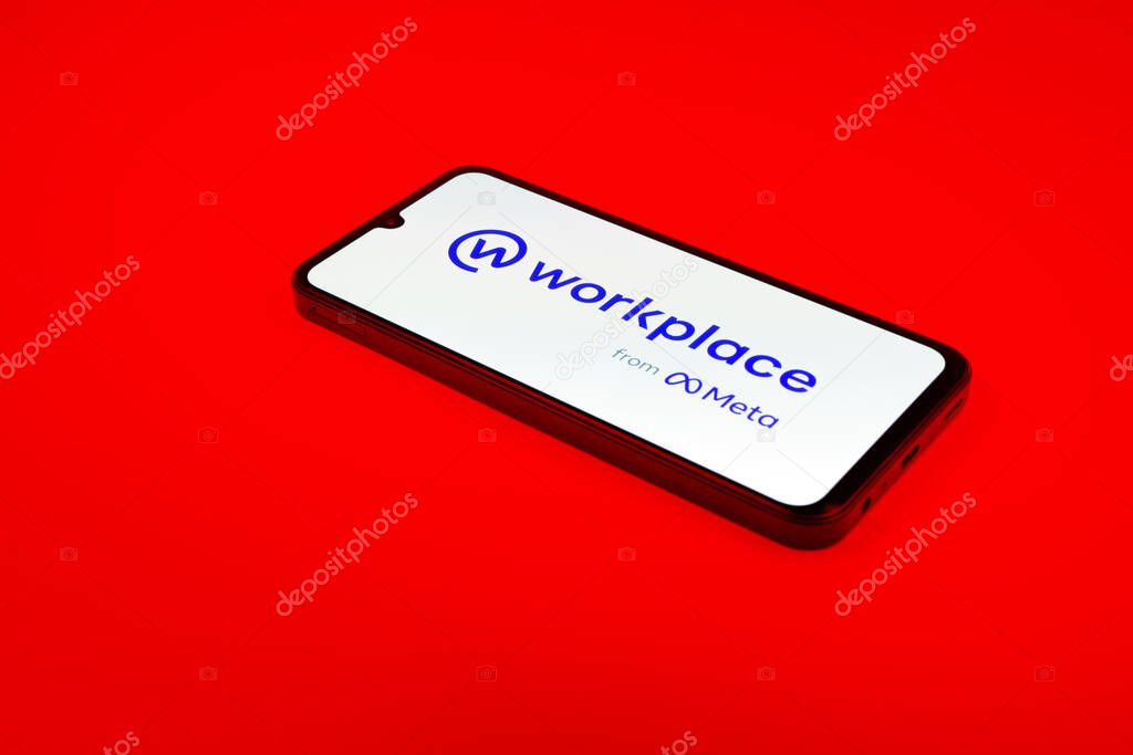 Prague, Czechia - 02 21 2025: Laptop on surface showing Workplace logo.