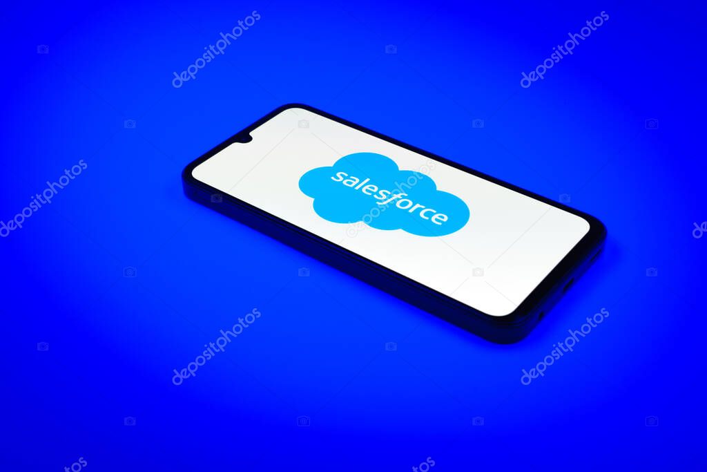 Prague, Czechia - 02 21 2025: Laptop on surface showing Salesforce logo.