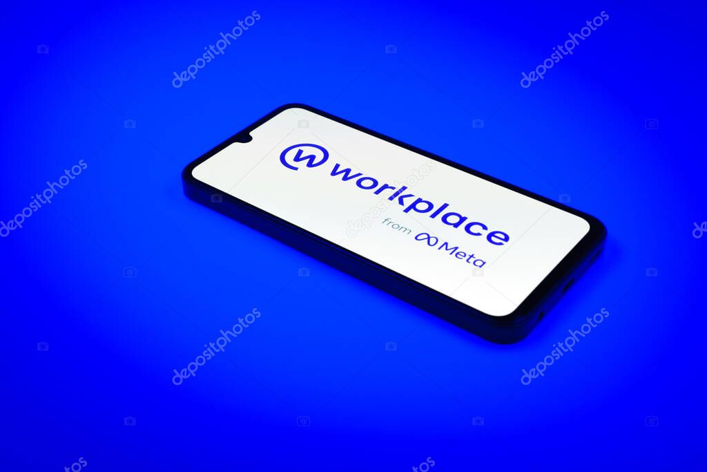 Prague, Czechia - 02 21 2025: Laptop on surface showing Workplace logo.