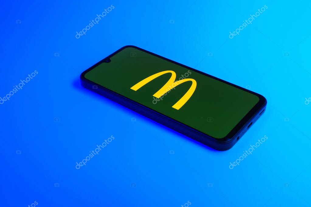Prague, Czechia - 02 21 2025: Laptop on surface showing McDonalds logo.