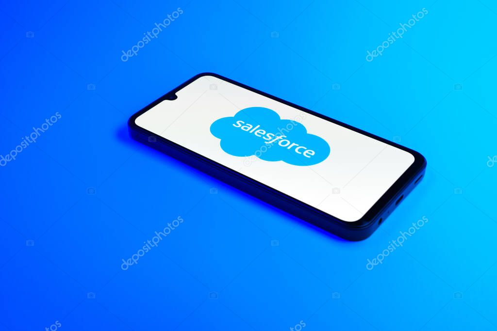 Prague, Czechia - 02 21 2025: Laptop on surface showing Salesforce logo.
