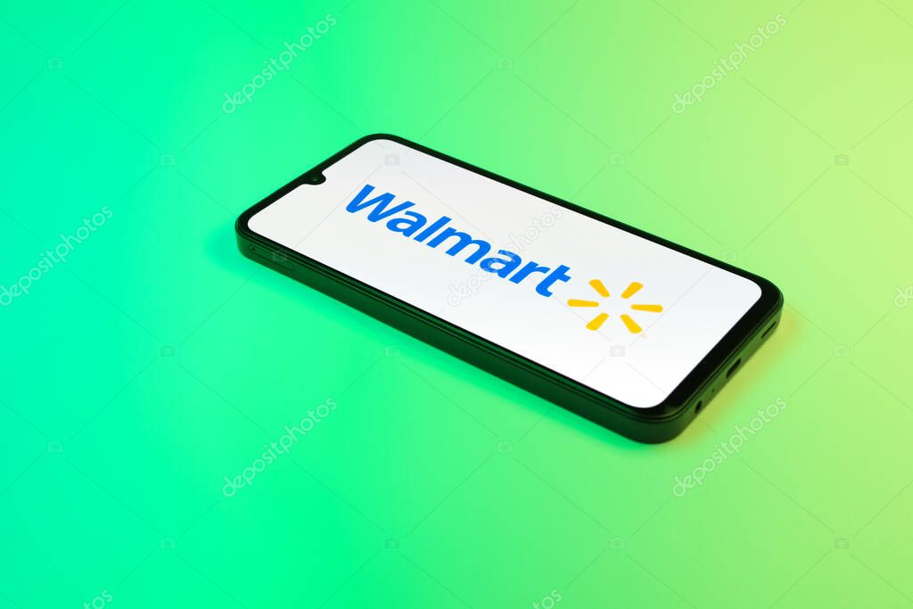 Prague, Czechia - 02 21 2025: Laptop on surface showing Walmart logo.