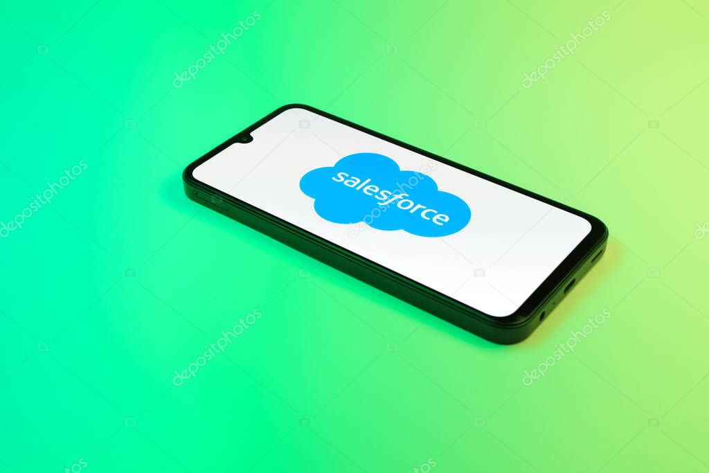Prague, Czechia - 02 21 2025: Laptop on surface showing Salesforce logo.