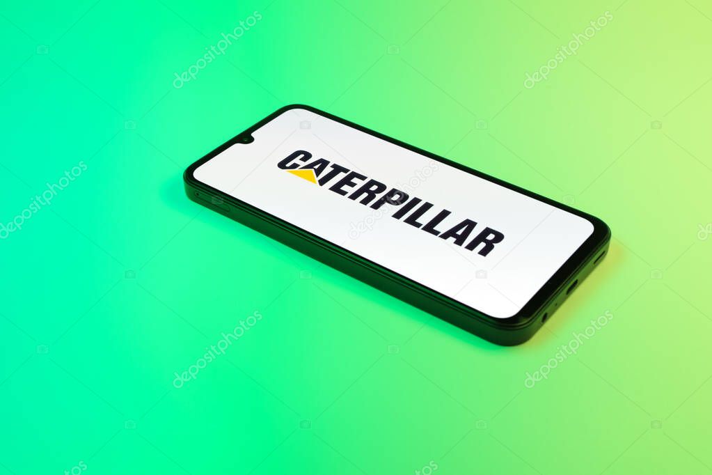 Prague, Czechia - 02 21 2025: Laptop on surface showing Caterpillar logo.