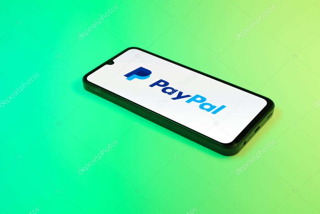 Prague, Czechia - 02 21 2025: Laptop on surface showing PayPal logo.