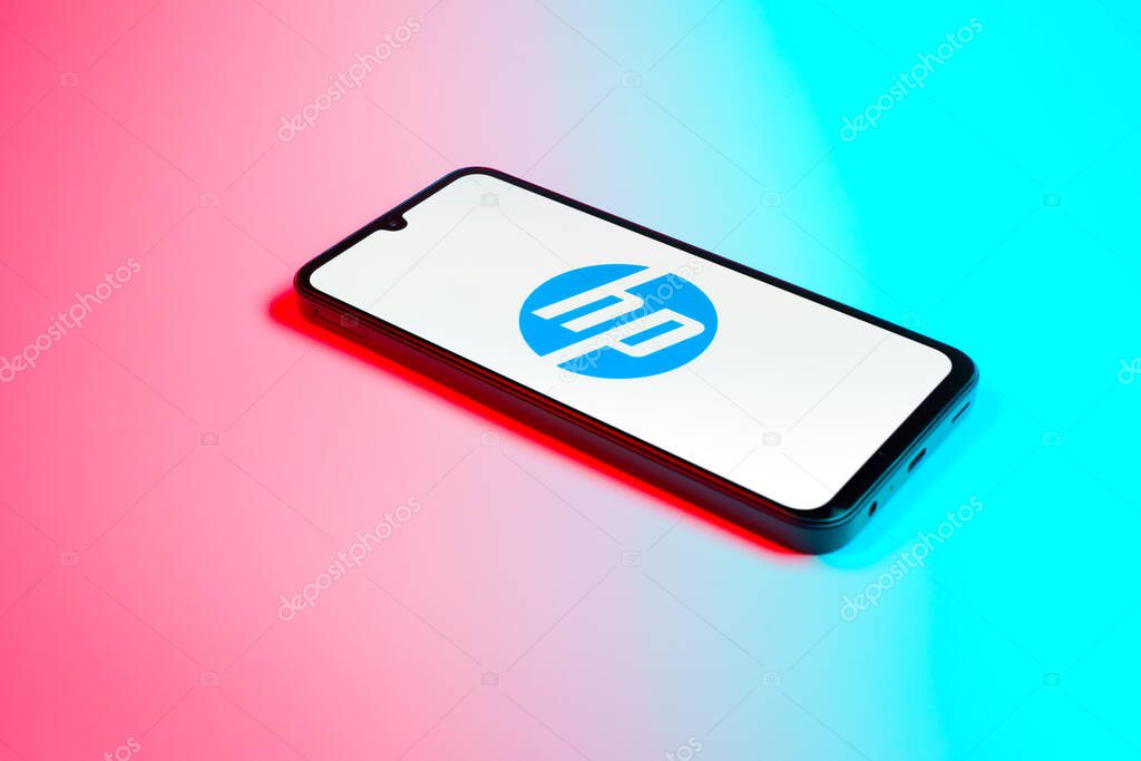 Prague, Czechia - 02 21 2025: Laptop on surface showing Hewlett-Packard logo.
