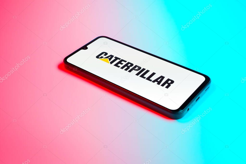 Prague, Czechia - 02 21 2025: Laptop on surface showing Caterpillar logo.