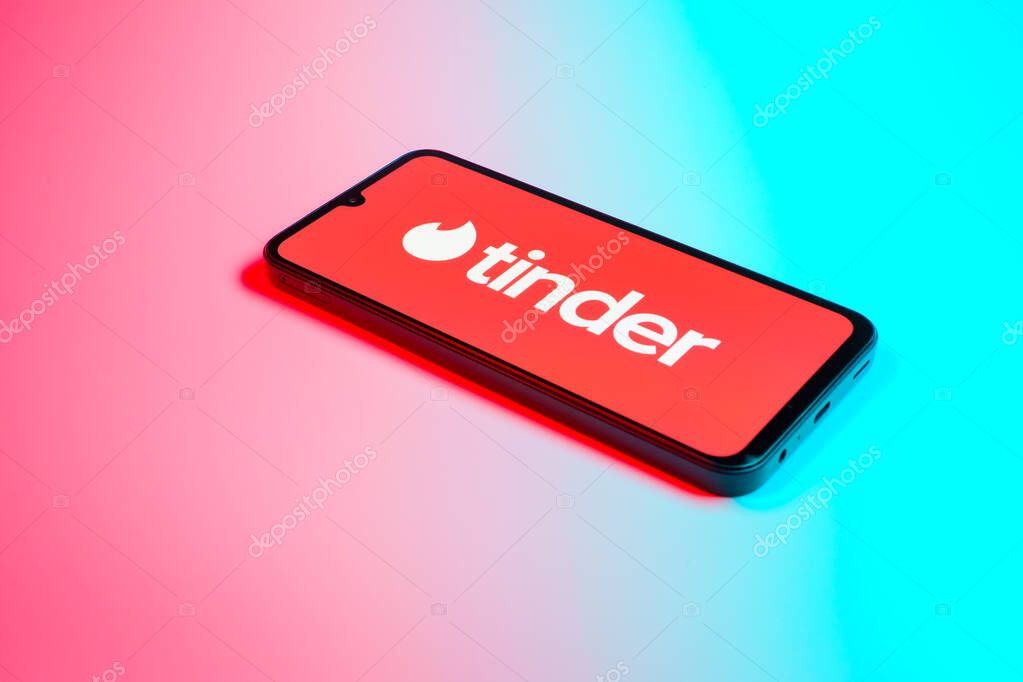 Prague, Czechia - 02 21 2025: Laptop on surface showing Tinder logo.