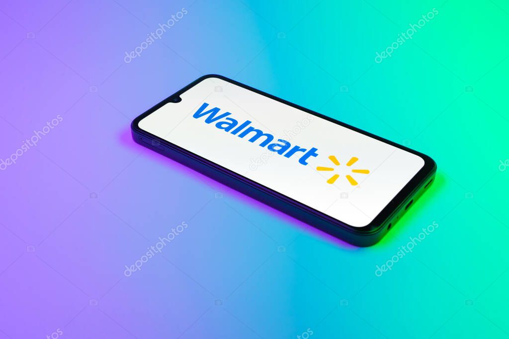 Prague, Czechia - 02 21 2025: Laptop on surface showing Walmart logo.