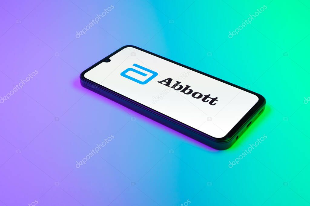 Prague, Czechia - 02 21 2025: Laptop on surface showing Abbott Laboratories logo.