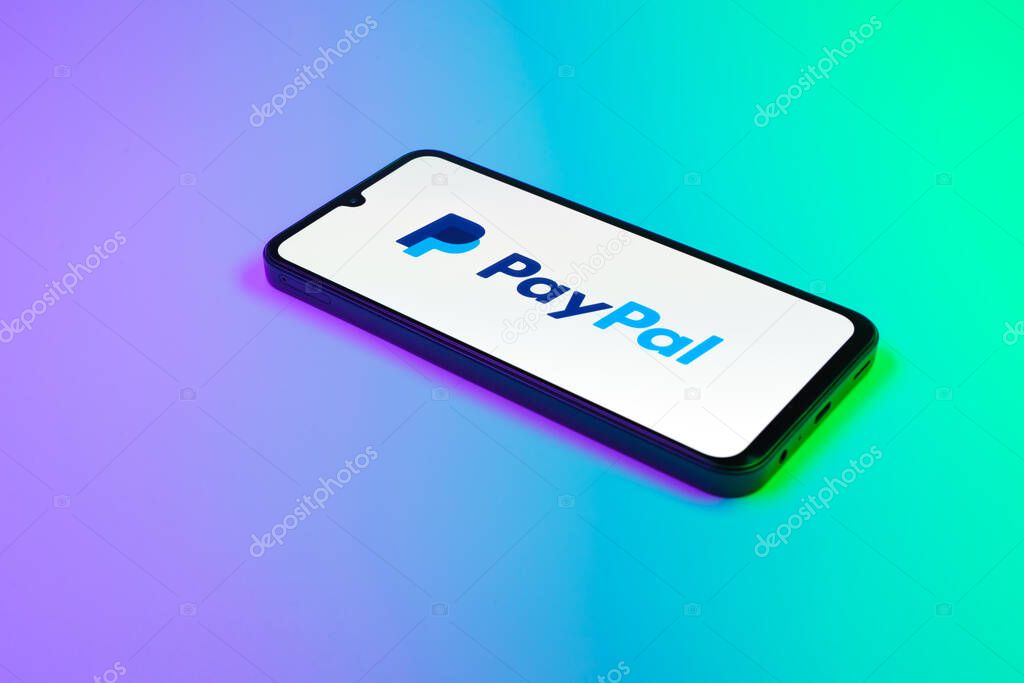 Prague, Czechia - 02 21 2025: Laptop on surface showing PayPal logo.