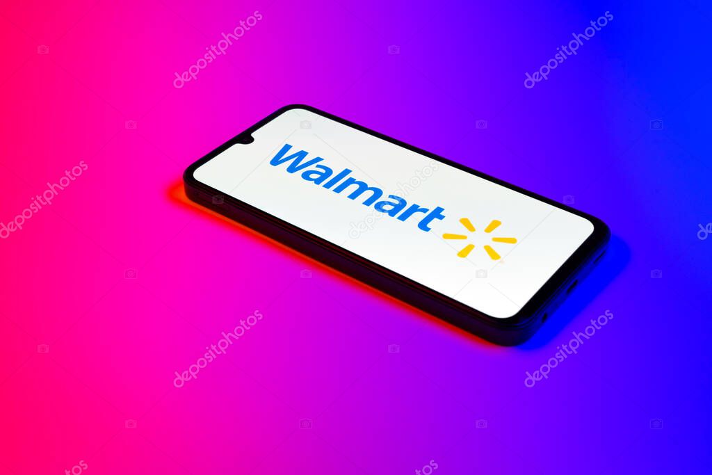 Prague, Czechia - 02 21 2025: Laptop on surface showing Walmart logo.