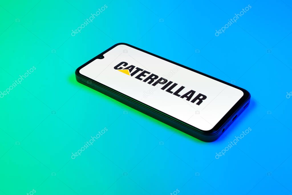 Prague, Czechia - 02 21 2025: Laptop on surface showing Caterpillar logo.