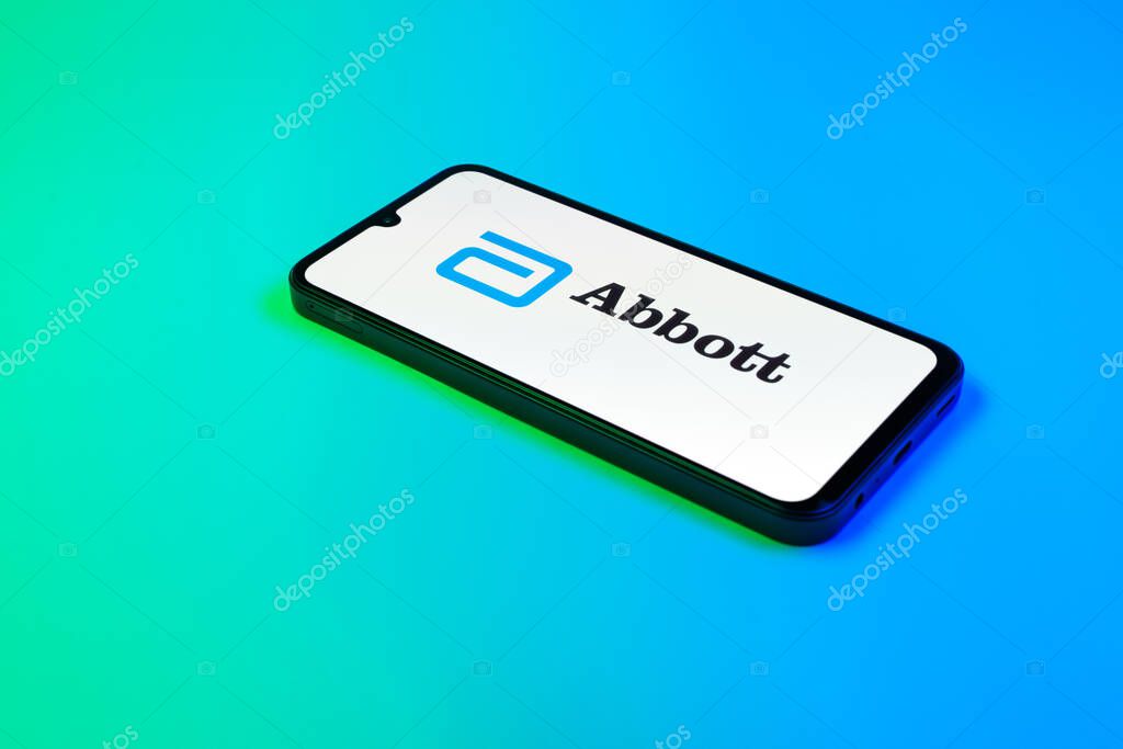 Prague, Czechia - 02 21 2025: Laptop on surface showing Abbott Laboratories logo.