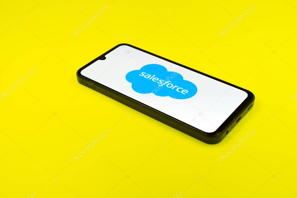 Prague, Czechia - 02 21 2025: Laptop on surface showing Salesforce logo.