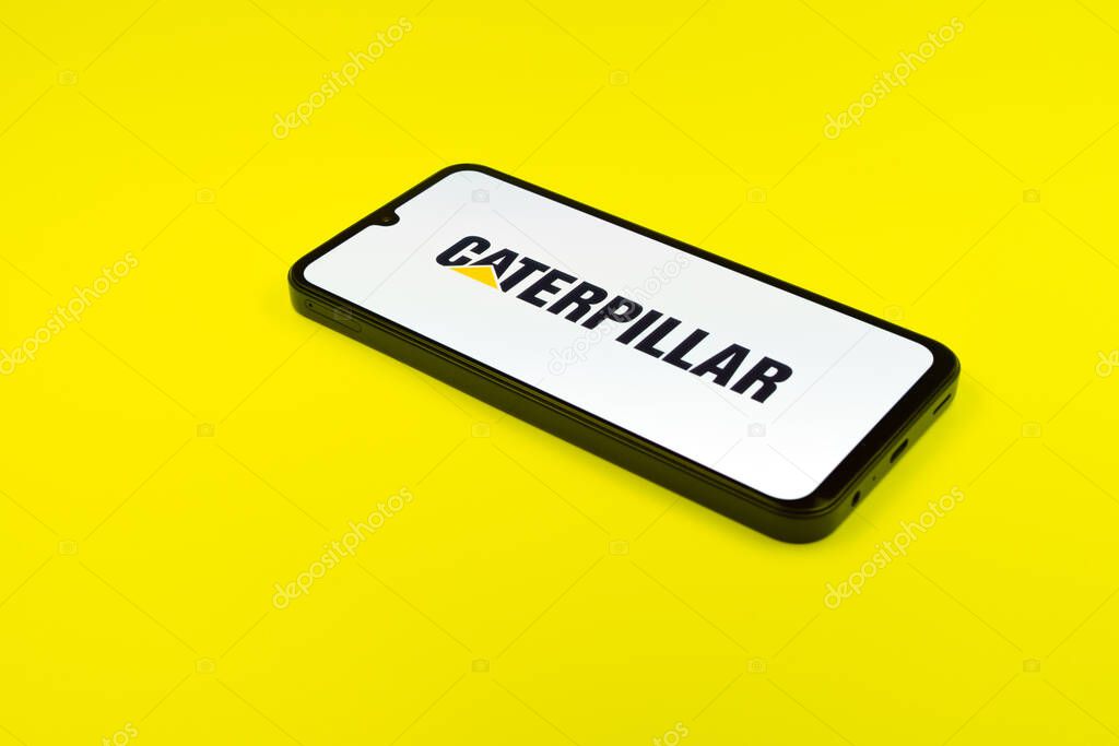 Prague, Czechia - 02 21 2025: Laptop on surface showing Caterpillar logo.