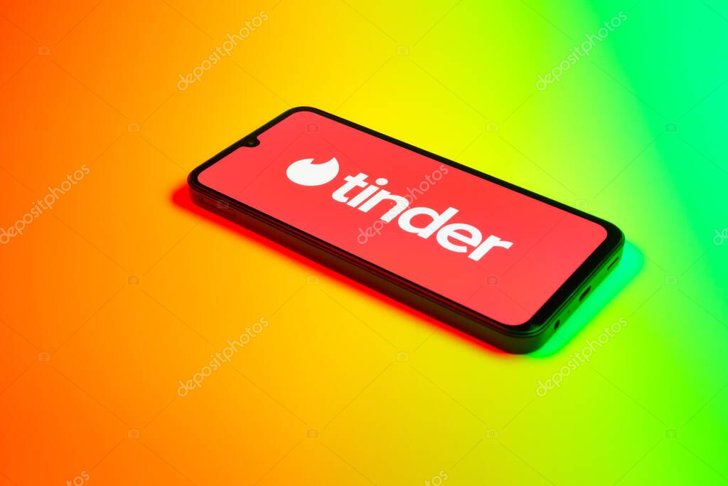 Prague, Czechia - 02 21 2025: Laptop on surface showing Tinder logo.