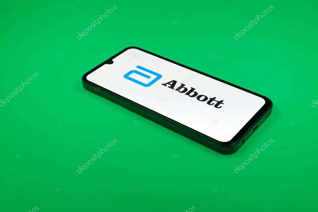 Prague, Czechia - 02 21 2025: Laptop on surface showing Abbott Laboratories logo.