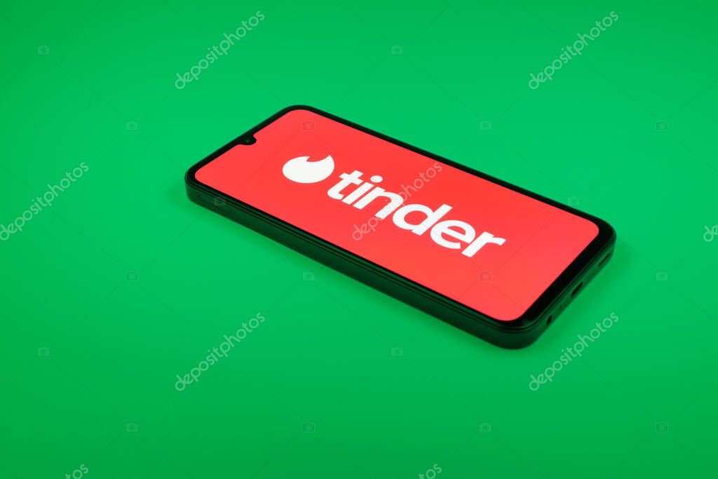 Prague, Czechia - 02 21 2025: Laptop on surface showing Tinder logo.