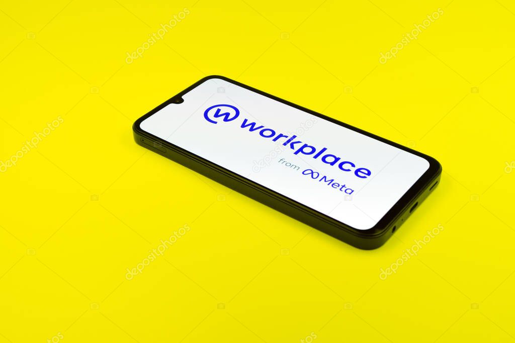 Prague, Czechia - 02 21 2025: Laptop on surface showing Workplace logo.