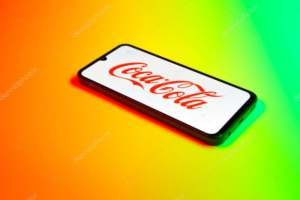 Prague, Czechia - 02 21 2025: Laptop on surface showing Coca-Cola logo.