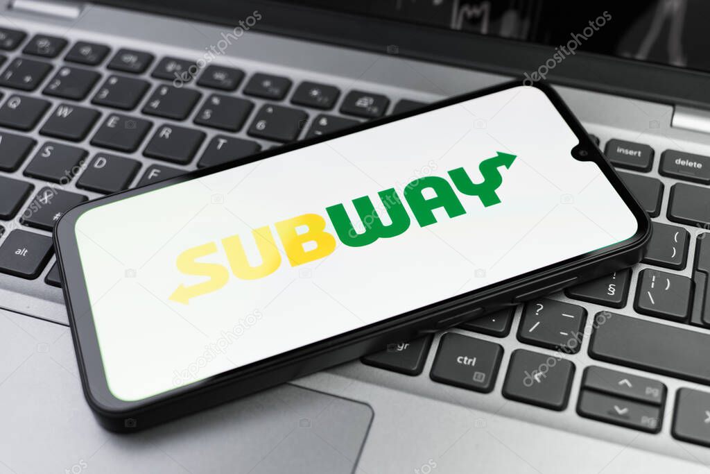 Prague, Czechia - 02 21 2025: Laptop on surface showing Subway logo.