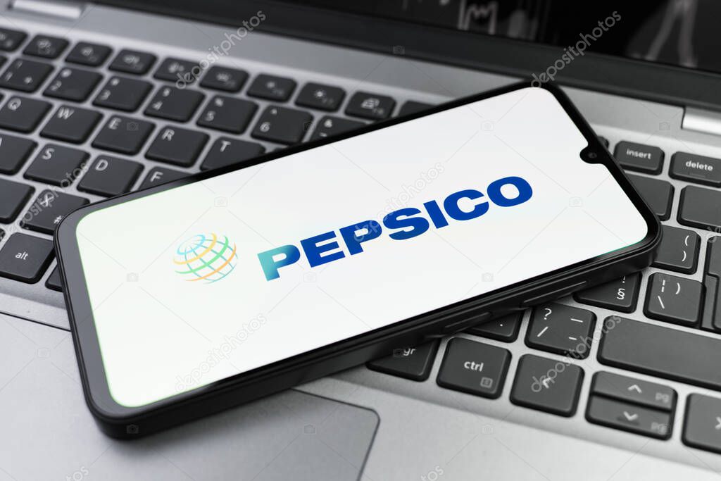 Prague, Czechia - 02 21 2025: Laptop on surface showing Pepsico logo.