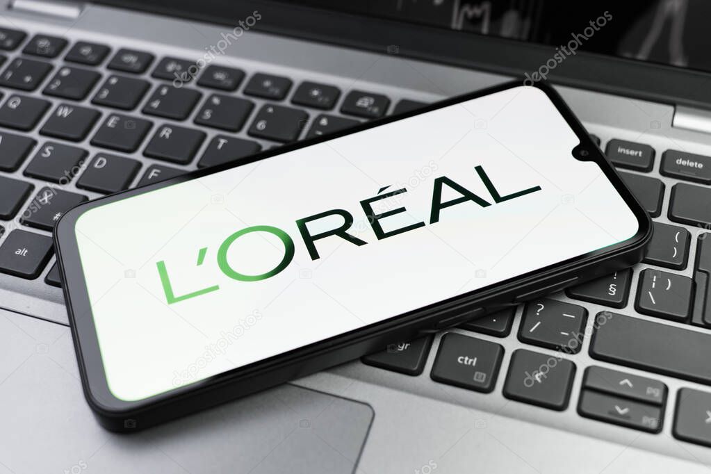 Prague, Czechia - 02 21 2025: Laptop on surface showing L'Oreal logo.