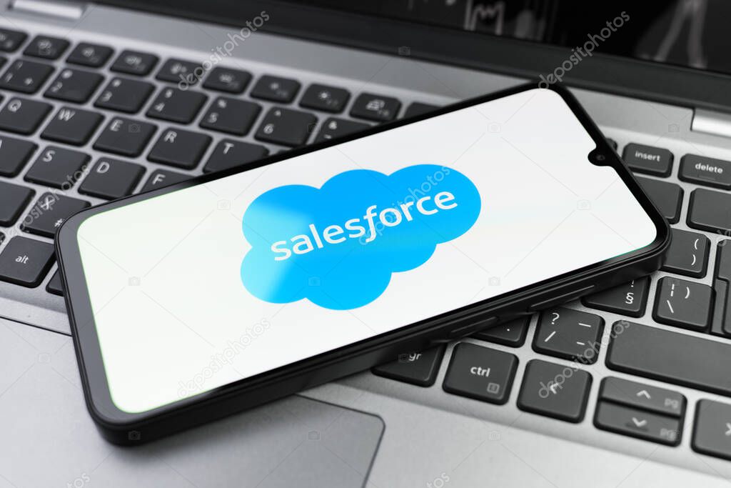 Prague, Czechia - 02 21 2025: Laptop on surface showing Salesforce logo.