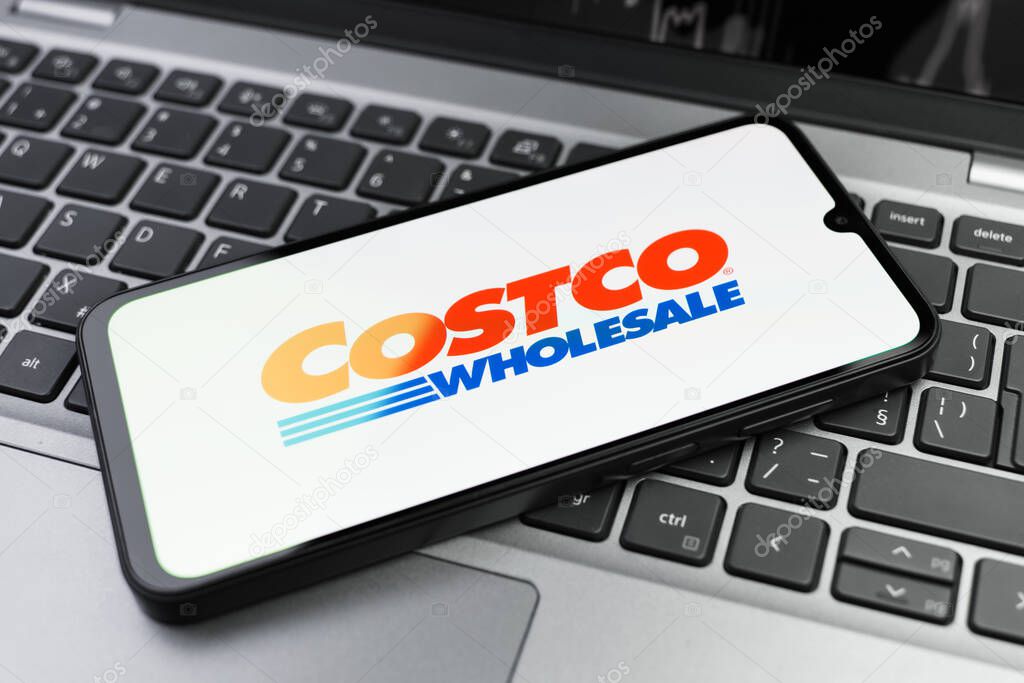 Prague, Czechia - 02 21 2025: Laptop on surface showing Costco logo.