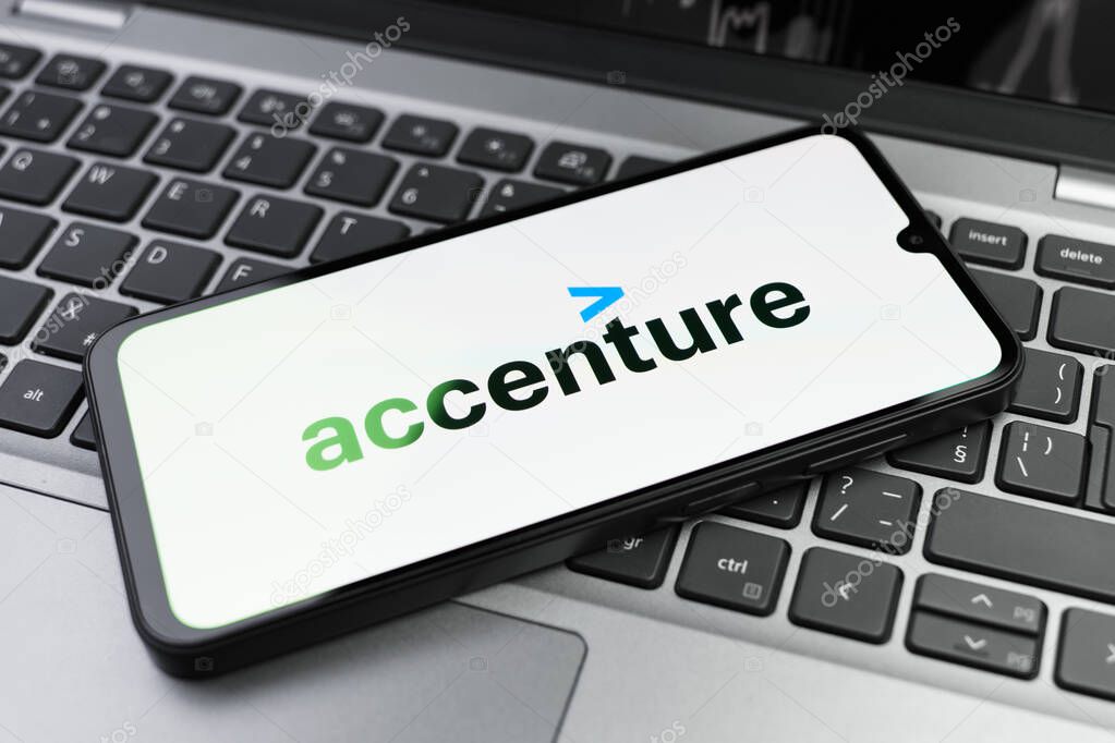 Prague, Czechia - 02 21 2025: Laptop on surface showing Accenture logo.