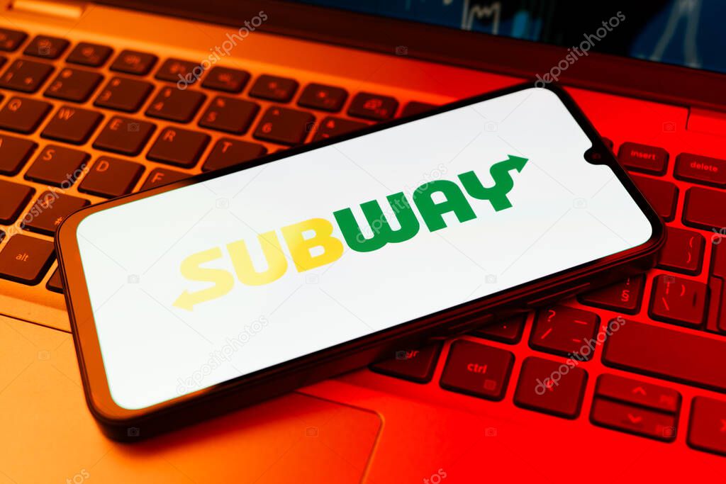 Prague, Czechia - 02 21 2025: Laptop on surface showing Subway logo.