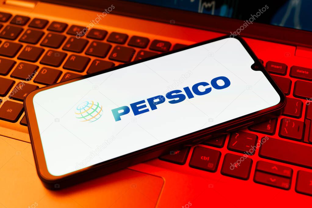 Prague, Czechia - 02 21 2025: Laptop on surface showing Pepsico logo.